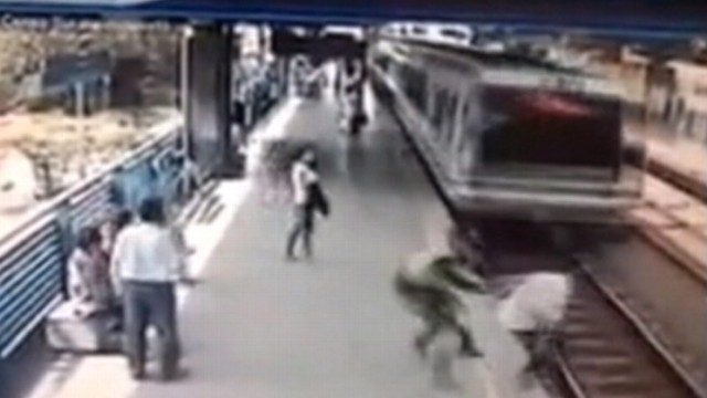 Video: Cops Last-Second Grab Saves Man from Speeding Train