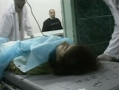 VIDEO: Gazan teenager, badly injured by Israeli shelling, is saved from ruins.