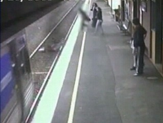 Train Narrowly Misses Baby on Tracks