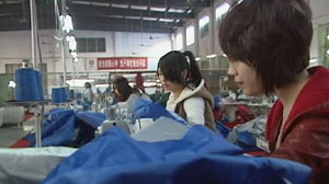 PHOTO Young workers assemble umbrellas in a factory in Songxia, China, Nov. 2010.