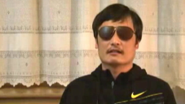 PHOTO: Guangcheng, a 40-year-old human rights activist who has campaigned for disabled rights and against forced abortions, scaled a wall and slipped past around 100 security guards surrounding his house.