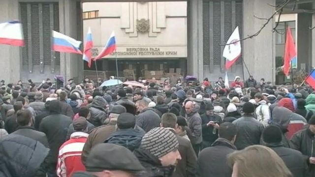 Pro-Russia supporters gathered outside the central parliament building in the Crimean region.