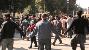 PHOTO Protesters in Cairo, Egypt formed a human line defense to keep out trouble makers.