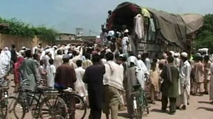 Extremist Groups Offer Aid to Flood Survivors