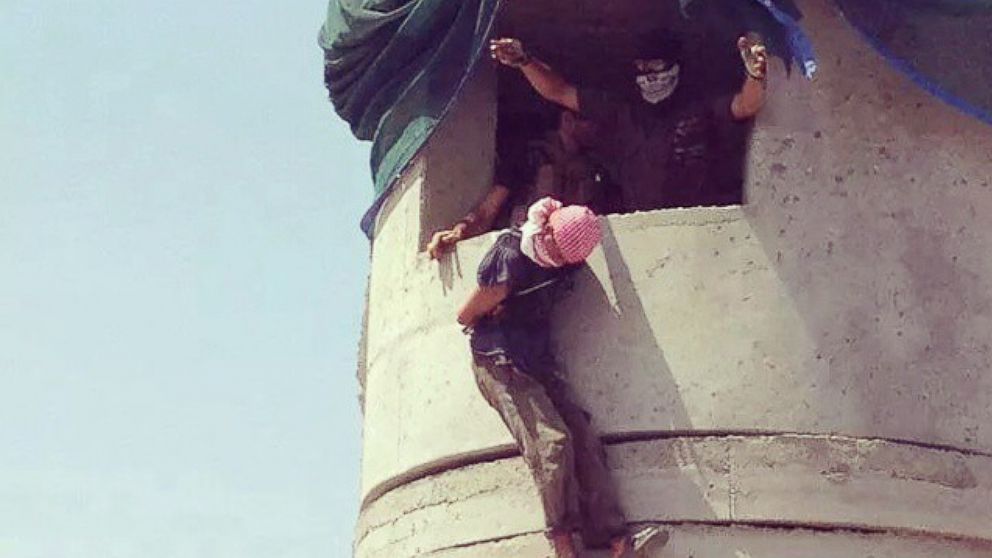 PHOTO: A bound and blindfolded detainee appears to be dropped – or possibly hung from the neck according to one analyst -- from what looks like an Iraqi military base guard tower. The image was posted on Instagram.