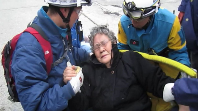 PHOTO Japanese Officials Rescue Woman
Eighty-year-old woman pulled from earthquake rubble in Japan