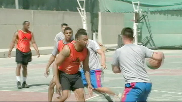 PHOTO: A basketball tournament in Kabul was interrupted this week by a Taliban attack, but after the seven attackers were killed, the teams insisted on completing the games.