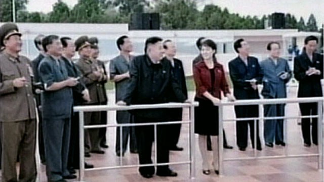 PHOTO: North Korea state TV is reporting for the first time that leader Kim Jong Un is married.