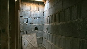 PHOTO: Shown here is the underground prison where rebels found and freed prisoners that were left there for dead.