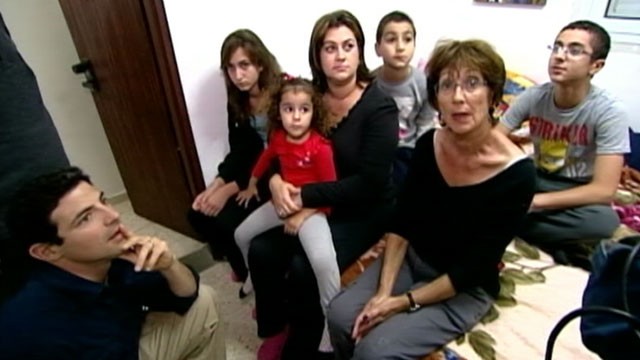 PHOTO: Screams, sirens and explosions are the sounds of a new routine for the three generations of the Malca family in Israels rocket-battered city of Ashkelon.