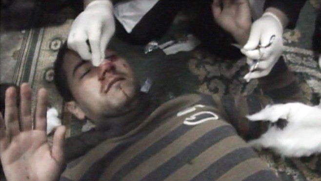 VIDEO: A mosque in Cairo becomes a makeshift clinic to treat wounded protesters.