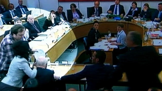 PHOTO: Rupert Murdoch is attacked at the Culture, Media and Sport Select Committee hearing on the News of the World phone-hacking scandal, July 19, 2011.
