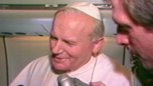 PHOTO: Pope John Paul II talks with the media on his plane in this undated file photo.