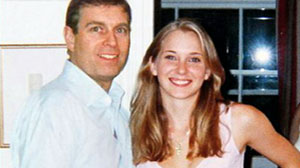 PHOTO Prince Andrew puts his arms around then 17-year-old Virginia Roberts, at the home of financier Jeffrey Epstein in 2001.