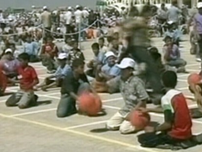 Video: Gazans attempt to break basketball bouncing record.