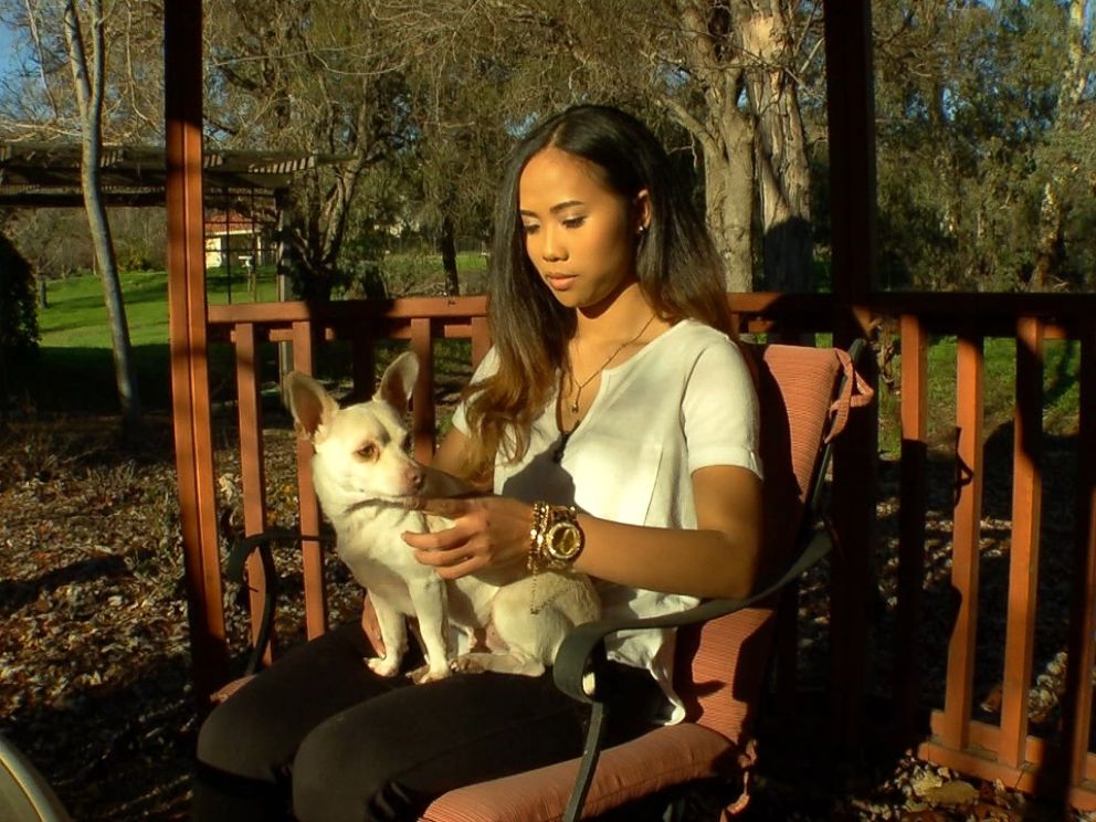 Sokha Chan, 22, is shown here with her dog during an interview with ABC News Nightline.