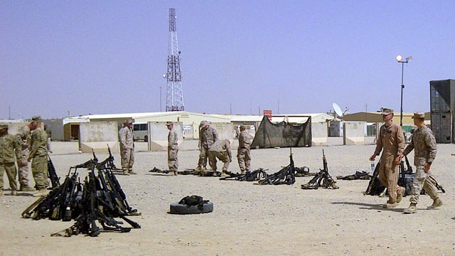 PHOTO: U.S. Marines were asked to lay down their weapons today before entering a tent where Defense Secretary Leon Panetta was scheduled to speak.