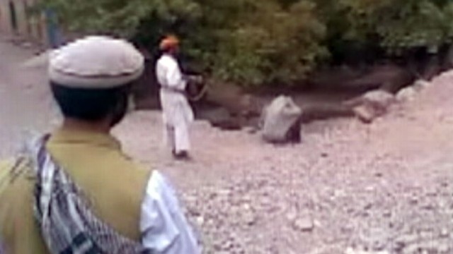 VIDEO: Video shows Taliban fighters executing a woman accused of adultery.