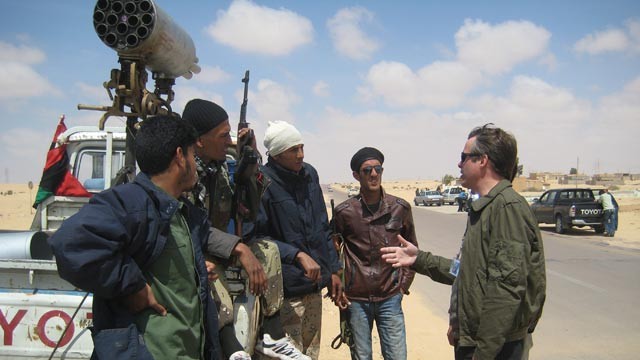 PHOTO Terry Moran spoke with a group of rebel soldiers at a staging area ten miles outside of Ajdabiya as they waited for orders to move on April 9, 2011.