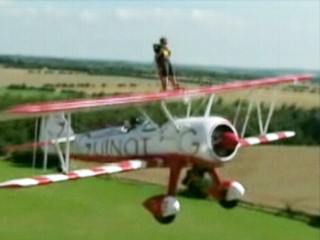 8-year-old Rides Plane Wing