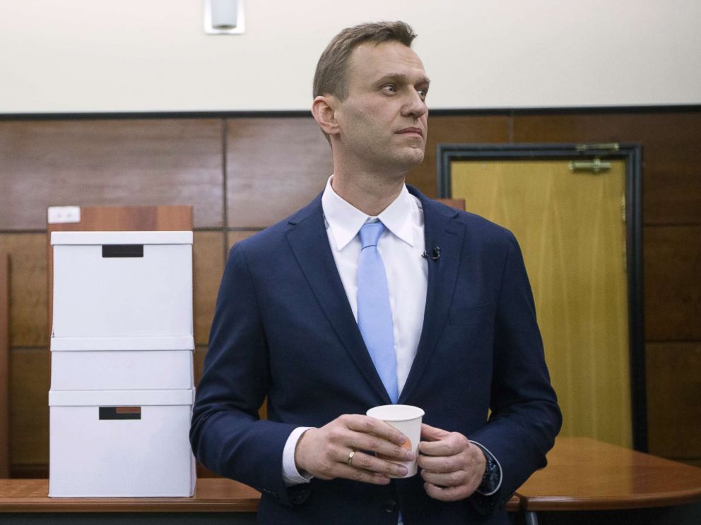 PHOTO: Russian opposition leader Alexei Navalny rests next to boxes with endorsement papers in support of his presidential bid to Russias Central Election in Moscow, Dec. 24, 2017.