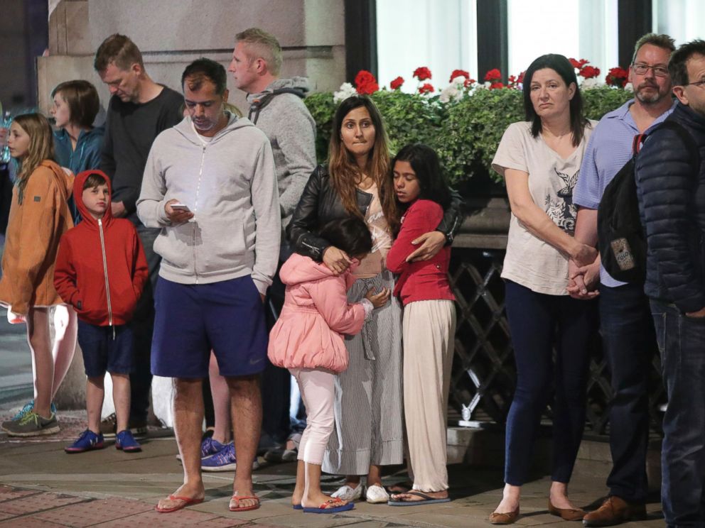 PHOTO: Guests from the Premier Inn Bankside Hotel are evacuated and kept in a group with police on Upper Thames Street following an incident in central London, June 3, 2017.