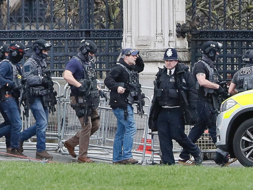 PHOTO: Armed police officers enter the Houses of Parliament in London, March 23, 2017 after the House of Commons sitting was suspended as witnesses reported sounds like gunfire outside.