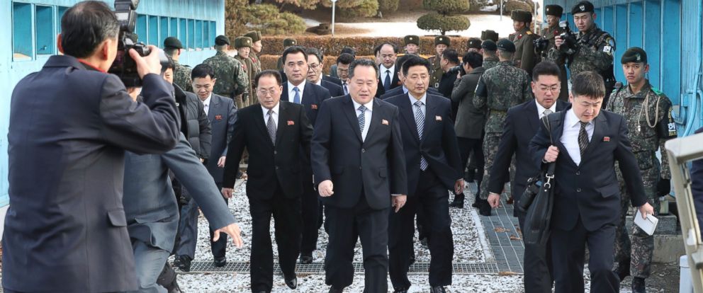 The head of North Korean delegation Ri Son Gwon, center, arrives at the South side for the meeting with South Korea at the Panmunjom in the Demilitarized Zone in Paju, South Korea, Tuesday, Jan. 9, 2018.