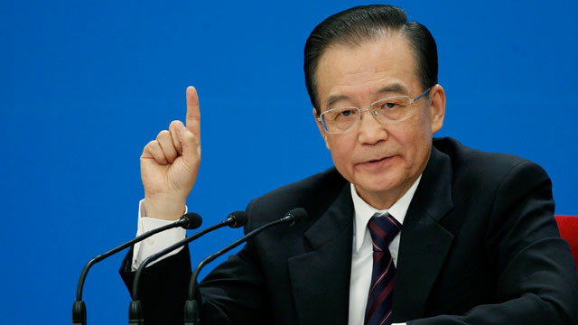 PHOTO: Chinese Premier Wen Jiabao gestures during a press conference after the closing session of the annual National People's Congress held in Beijing's Great Hall of the People, in China, March 14, 2012.