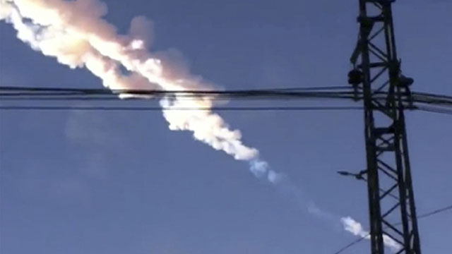 PHOTO: A meteorite contrail is seen in Chelyabinsk region on Friday, Feb. 15, 2013. A meteor streaked across the sky of Russia?s Ural Mountains, causing sharp explosions and reportedly injuring around 100 people, including many hurt by broken glass.