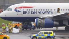 PHOTO: Emergency services attend a British Airways passenger plane after it had to make an emergency landing at London's Heathrow Airport Friday May 24, 2013.