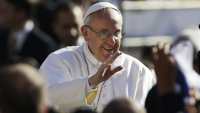 PHOTO: Pope Francis waves to crowds as he arrives to his inauguration Mass in St. Peters Square at the Vatican, Tuesday, March 19, 2013.