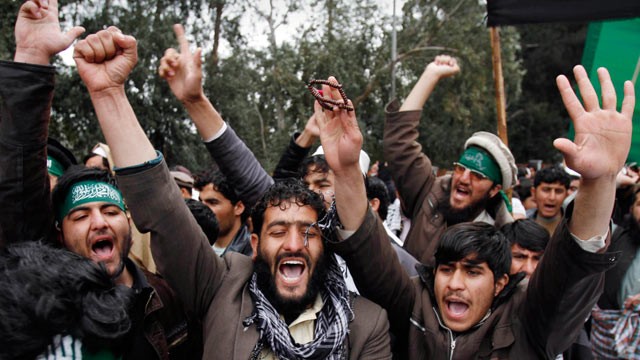 PHOTO: Demonstrators chant anti U.S. slogans following Sundays killing of civilians in Panjwai, Kandahar by a U.S. soldier during a protest in Jalalabad east of Kabul, Afghanistan on March 13, 2012.