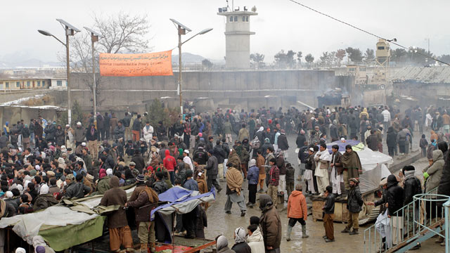 PHOTO: Afghan protesters are seen in front of the US base of Bagram during an anti US demonstration in Bagram north of Kabul, Afghanistan Feb. 21, 2012.