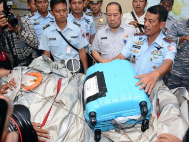 PHOTO: Indonesian Air Force officials show AirAsia Flight 8501 debris during a press conference at the airbase in Pangkalan Bun, Central Borneo, Indonesia, Dec. 30, 2014.