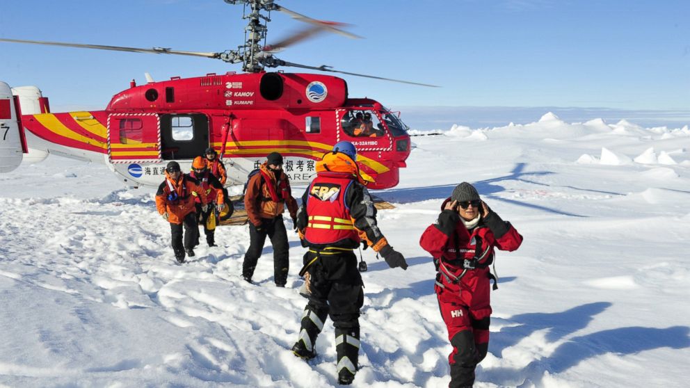 PHOTO: The first group of passengers who were aboard the trapped Russian vessel MV Akademik Shokalskiy, arrive at a safe surface off the Antarctic, Jan. 2, 2014.