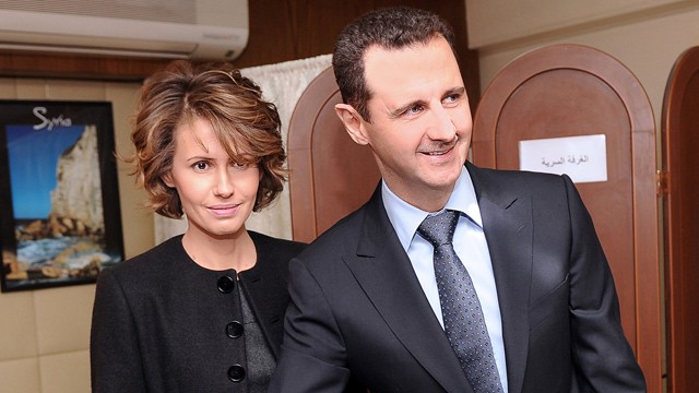 PHOTO: Syrian President Bashar Assad casts his ballot next to his wife Asma at a polling station, in Damascus, Syria, in this Feb. 26, 2012 file photo.