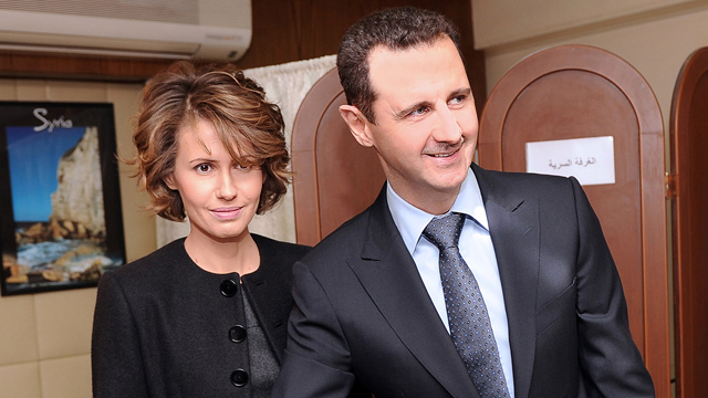 PHOTO: Syrian President Bashar Assad casts his ballot next to his wife Asma at a polling station, in Damascus, Syria, in this Feb. 26, 2012 file photo.
