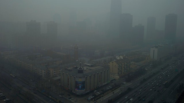 PHOTO: Skyscrapers are obscured by heavy haze in Beijing Sunday, Jan. 13, 2013.