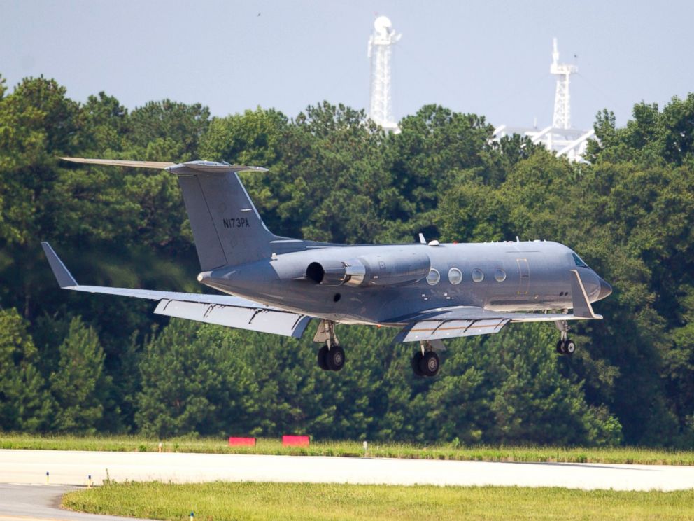 PHOTO: A private plane arrives at Dobbins Air Reserve Base in Marietta, Ga. transporting the second American stricken with Ebola, Nancy Writebol, on Aug. 5, 2014. 