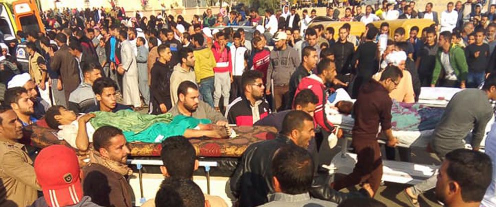 PHOTO: Injured people are evacuated from the scene of a militant attack on a mosque in Bir al-Abd in the northern Sinai Peninsula of Egypt on Friday, Nov. 24, 2017.