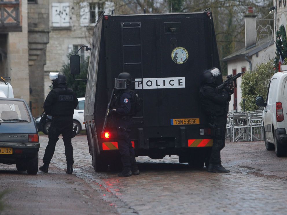 PHOTO: French riot officers patrol in Longpont, north of Paris, France, Jan. 8, 2015.