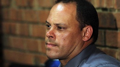 PHOTO: Investigating officer Hilton Botha, sits inside the court witness box during the Oscar Pistorius bail hearing at the magistrate court in Pretoria, South Africa, Feb. 20, 2013.