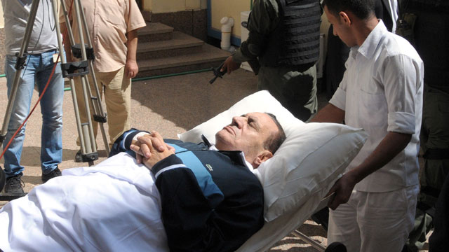 PHOTO: In this Sept. 7, 2011 file photo, former Egyptian president Hosni Mubarak lies on his bed while being taken to the courtroom for another session of his trial in Cairo, Egypt.
