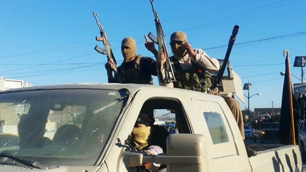 PHOTO: In this June 30, 2014 photo, militants from the al-Qaida-inspired Islamic State of Iraq and the Levant (ISIL) celebrating the groups declaration of an Islamic state, in Fallujah, Iraq.