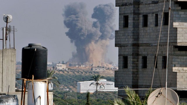 PHOTO: Smoke rises following an Israeli attack east of Gaza City, seen from Bureij refugee camp, central Gaza Strip, Nov. 20, 2012.