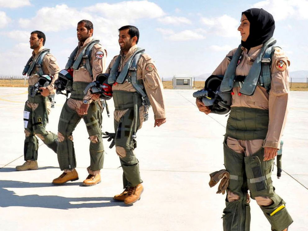 PHOTO: This June 13, 2013 photo provided by the Emirates News Agency, WAM, shows Mariam Al Mansouri, the first Emirati female fighter jet pilot, right, walking with other pilots at an undisclosed location in United Arab Emirates.