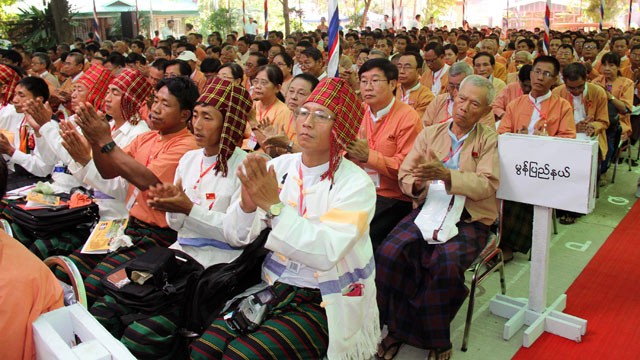 PHOTO: In this photo released from National League for Democracy (NLD), the party's representatives clap during one day advance meeting of their first ever party's congress at Royal Rose restaurant, March 8, 2013, in Yangon, Myanmar.