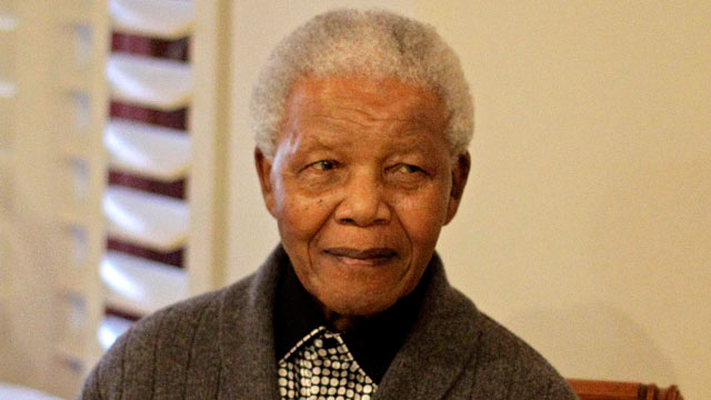 PHOTO: Former South African President Nelson Mandela celebrates his birthday with family in Qunu, South Africa, July 18, 2012. The South African presidency says Nelson Mandela was re-admitted to hospital with a recurrence of a lung infection, March 28, 20