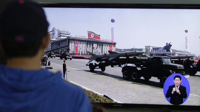 PHOTO: South Koreans watch TV news showing a footage of North Korean missiles on a military parade, at a Seoul Train Station in Seoul, South Korea, Saturday, May 18, 2013.